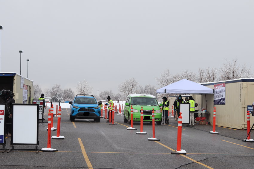 The mass COVID-19 vaccination site at Dick’s Sporting Goods Park in Commerce City that opened March 22. The site’s goal is to administer 2,000 doses of the COVID-19 vaccine a day and increase that to 6,000 per day. People drive up to a window to receive a shot. People can sign up by calling 720-263-5737 or by visiting https://www.centura.org/covid-19/covid-19-vaccine-information/vaccine-events.